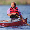 A family canoeing on a lake